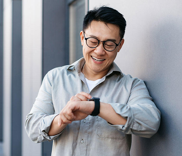 Man checking watch for the time
