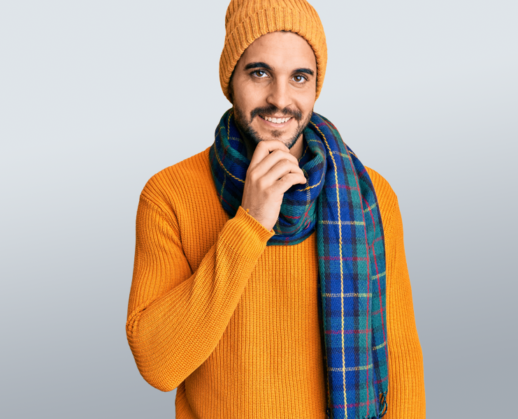man with scarf smiling