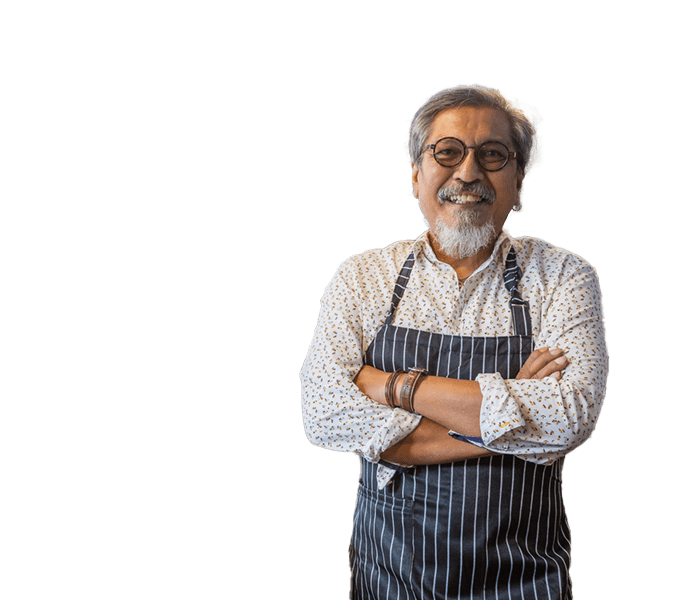 Older man with business apron